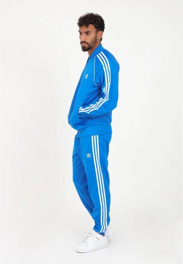adidas Originals Blauwe herenbroek met verticale strepen en logo Blauw Heren