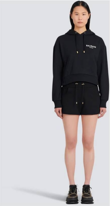 Balmain Ecologisch ontworpen katoenen sweatshirt met fluweelachtig logo Zwart Dames