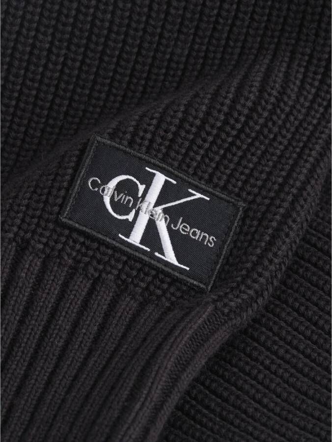 Calvin Klein Zwarte trui met klassieke V-hals en geribbelde textuur Zwart Dames