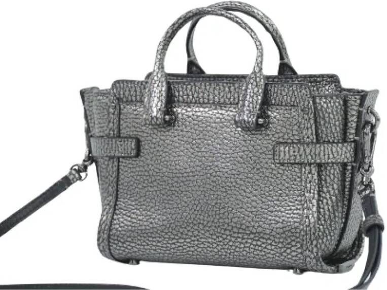 Coach Pre-owned Metal handbags Gray Dames
