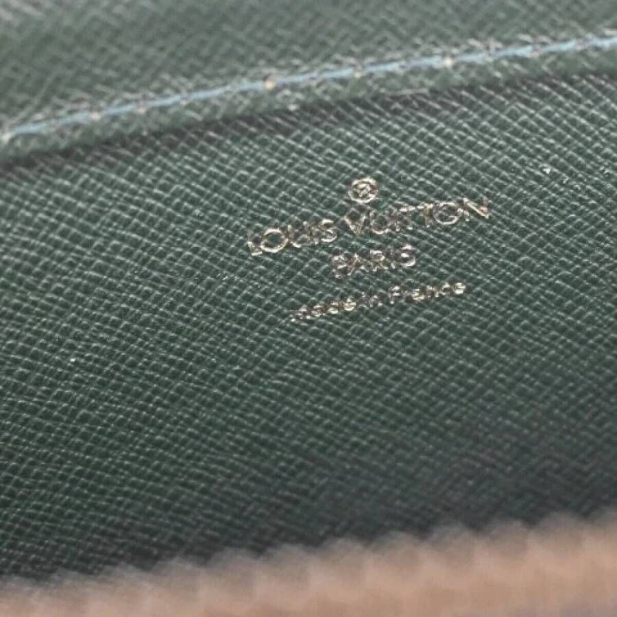 Louis Vuitton Vintage Pre-owned Leather clutches Green Dames