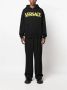 Versace Zwarte katoenen trui met gele logoprint Zwart Heren - Thumbnail 2