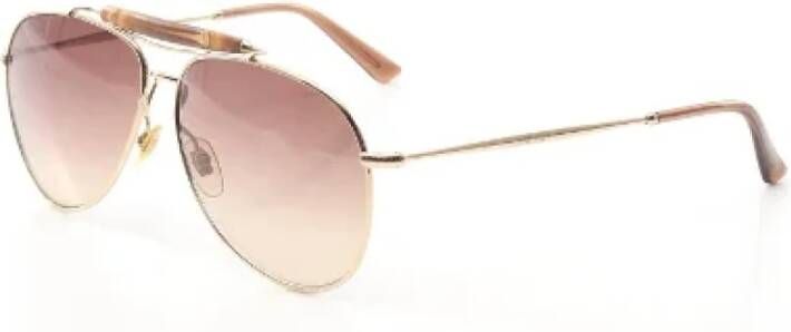 Gucci Vintage Pre-owned Metal sunglasses Bruin Dames