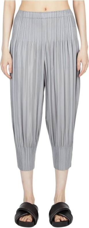 Issey Miyake Geplooide taps toelopende broek Grijs Dames