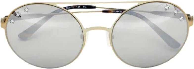 Michael Kors Pre-owned Metal sunglasses Yellow Dames