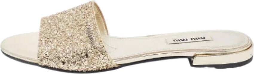 Miu Pre-owned Leather flats Yellow Dames