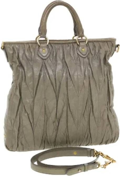 Miu Pre-owned Leather handbags Grijs Dames