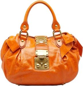Miu Pre-owned Leather handbags Oranje Dames