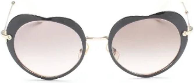 Miu Pre-owned Plastic sunglasses Zwart Dames
