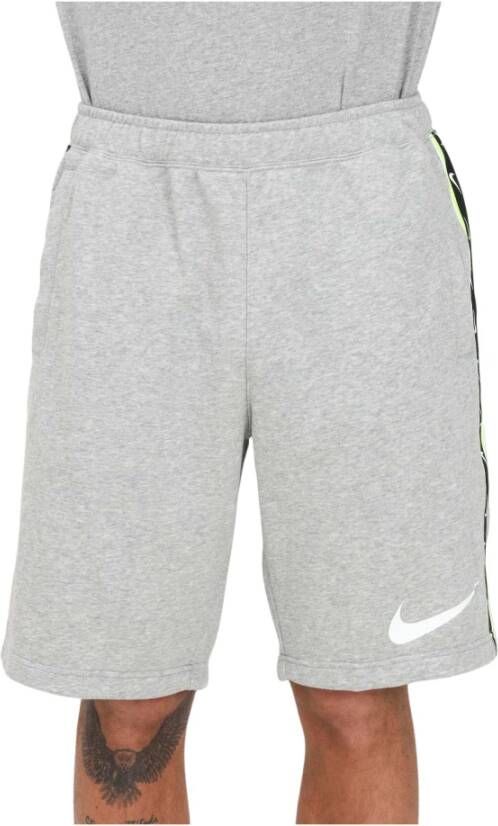 Nike Sportswear herenshorts van sweatstof met herhaald patroon Grijs