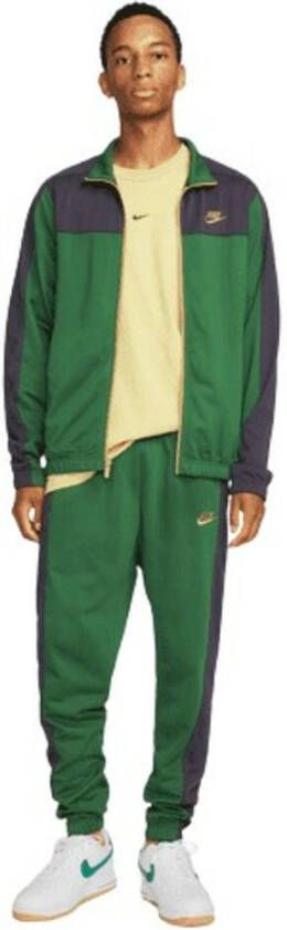 Nike Sportswear Sport Essentials Trainingspak van poly-knit materiaal voor heren Groen