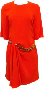 Stella McCartney Pre-owned Fabric dresses Oranje Dames