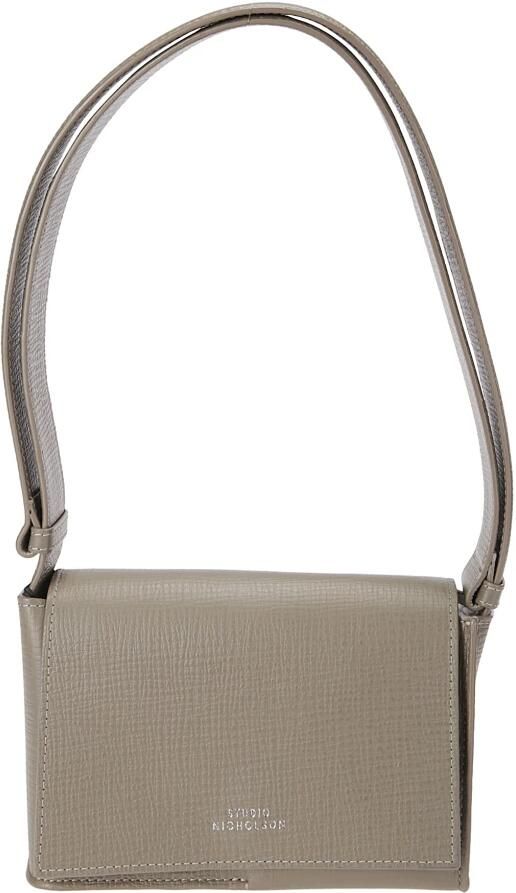 Studio Nicholson Leren schoudertas met bedrukt logo Beige Dames