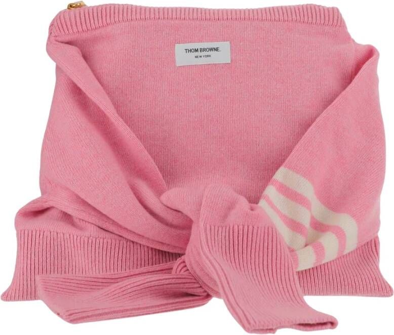 Thom Browne Sweater-shaped bag made of merino wool Sleeves that double as shoulder straps adjustable Iconic triple contrasting band Zipper top closure Logo label detail Pink white Made in Italy Composition: 100% merino wool Roze Dames