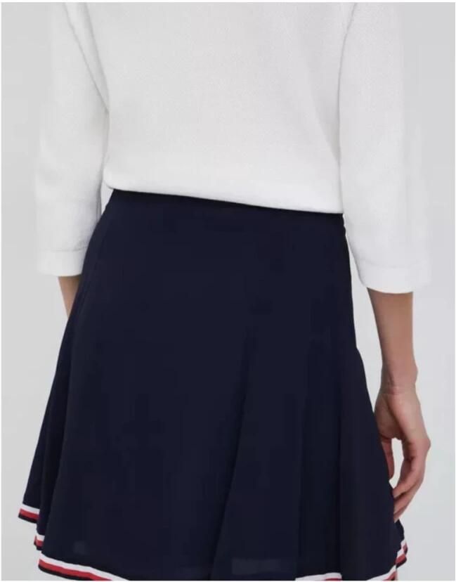 Tommy Hilfiger Regular Fit Klokkende Rok. De elegante klokkende rok is afgewerkt met een iconisch lintdetail aan de onderkant wat een verfijnde kleurnoot toevoegt. Blue Dames - Foto 2