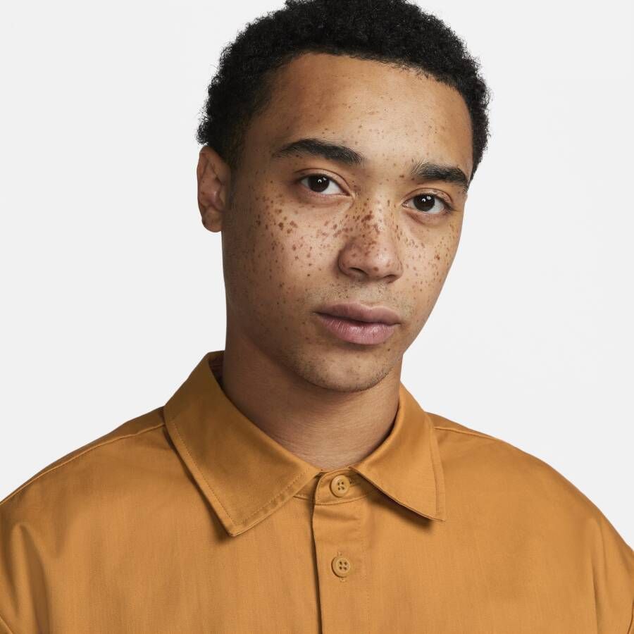 Nike Club Herentop met korte mouwen en knoopsluiting Bruin