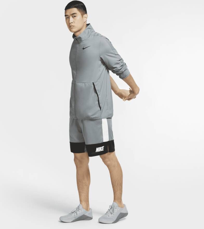 Nike Dri-FIT Geweven trainingsjack voor heren Grijs