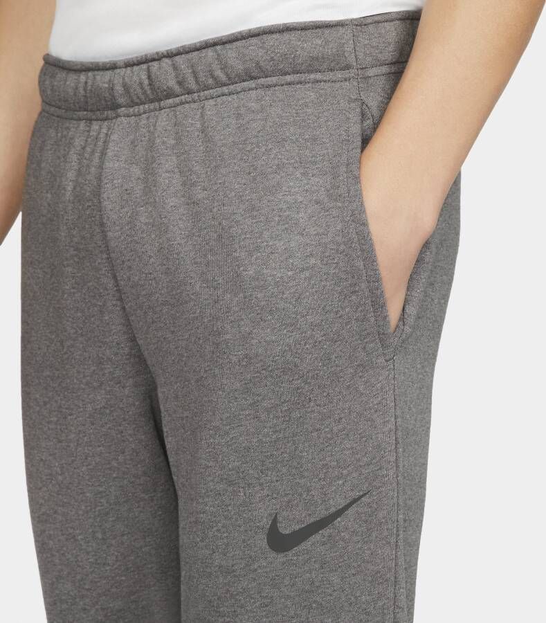 Nike Dry Dri-FIT toelopende fitnessbroek van fleece voor heren Grijs