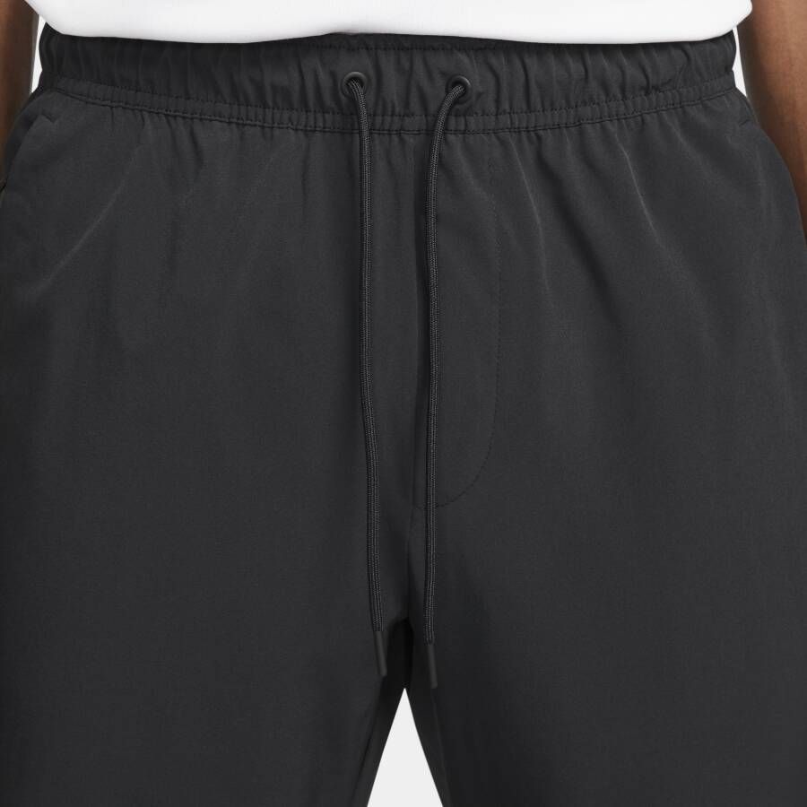 Nike Unlimited Dri-FIT veelzijdige herenbroek met ritsboord Zwart - Foto 3