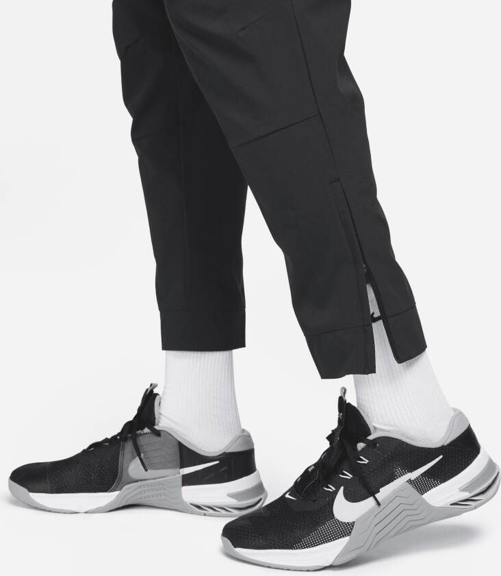 Nike Unlimited Dri-FIT veelzijdige herenbroek met ritsboord Zwart - Foto 5