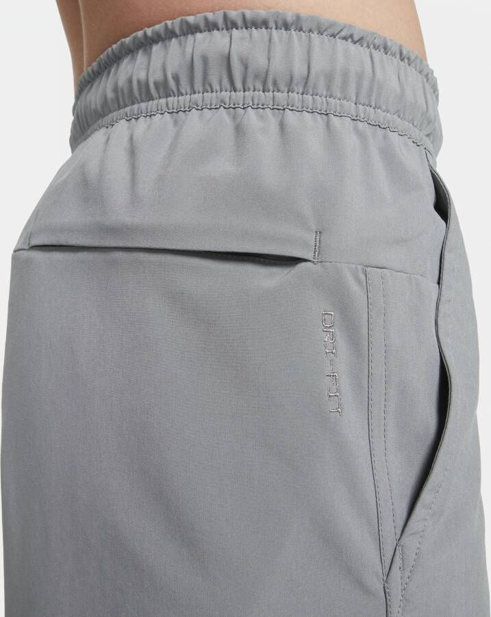 Nike Unlimited multifunctionele niet-gevoerde herenshorts met Dri-FIT (18 cm) Grijs - Foto 4