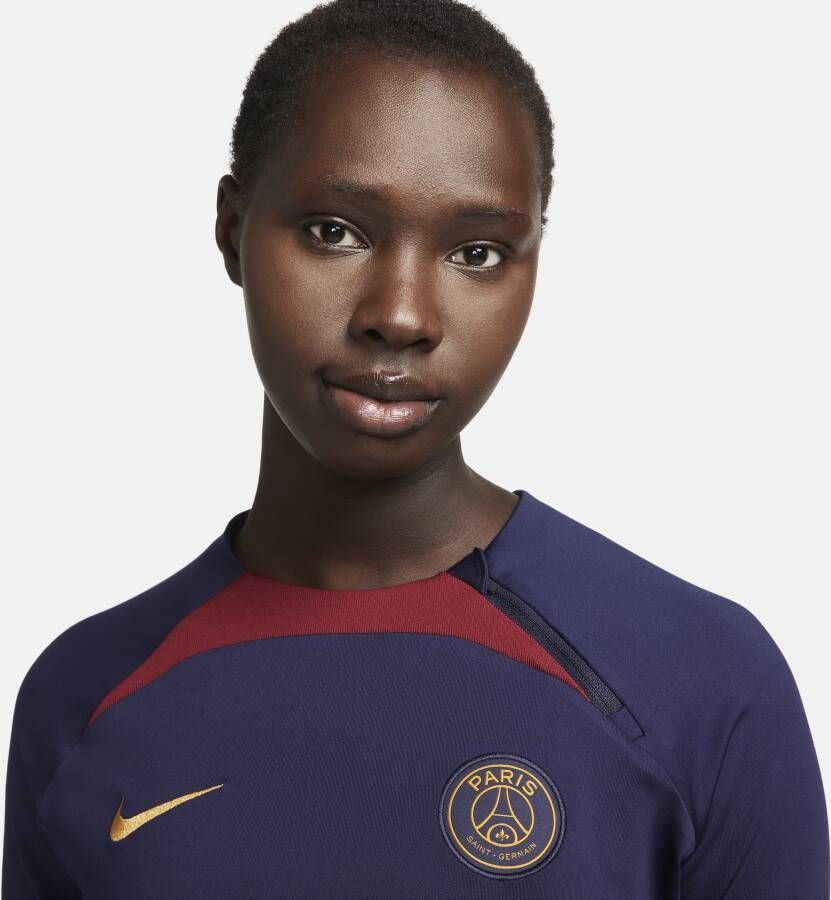 Nike Paris Saint-Germain Strike Dri-FIT voetbaltrainingstop met ronde hals voor dames Blauw
