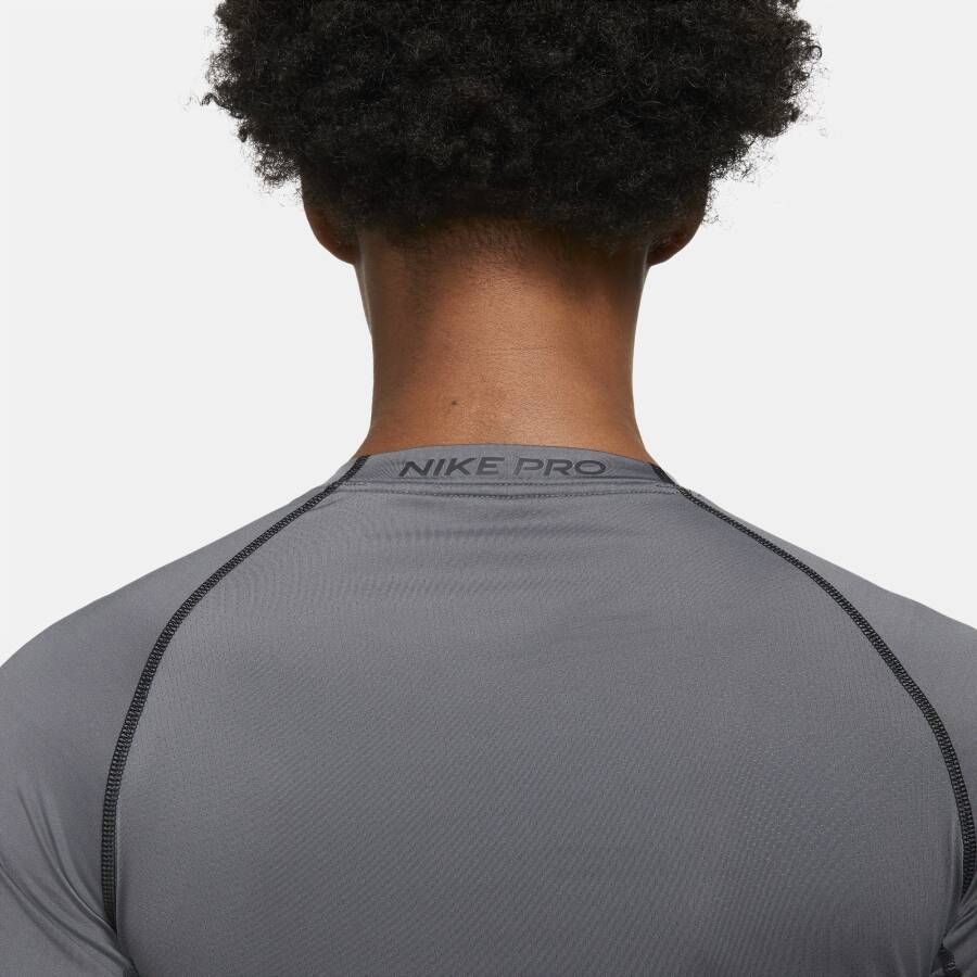 Nike Pro Dri-FIT Herentop met lange mouwen en strakke pasvorm Grijs