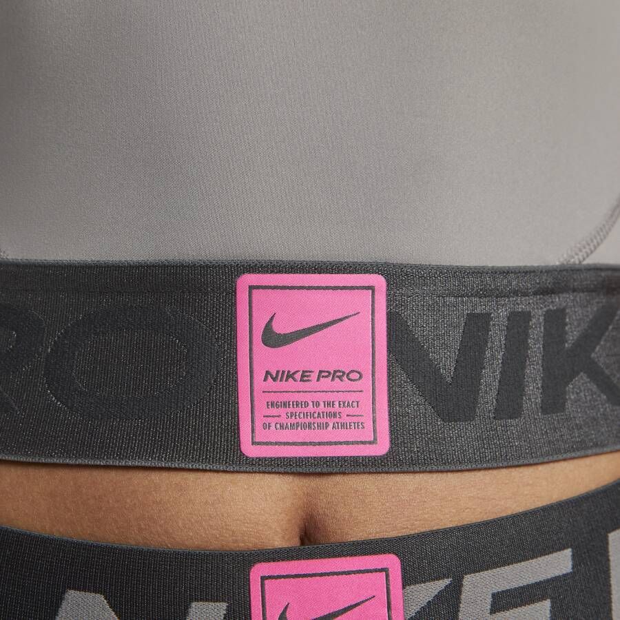 Nike Pro Dri-FIT Korte tanktop met graphic voor dames Grijs
