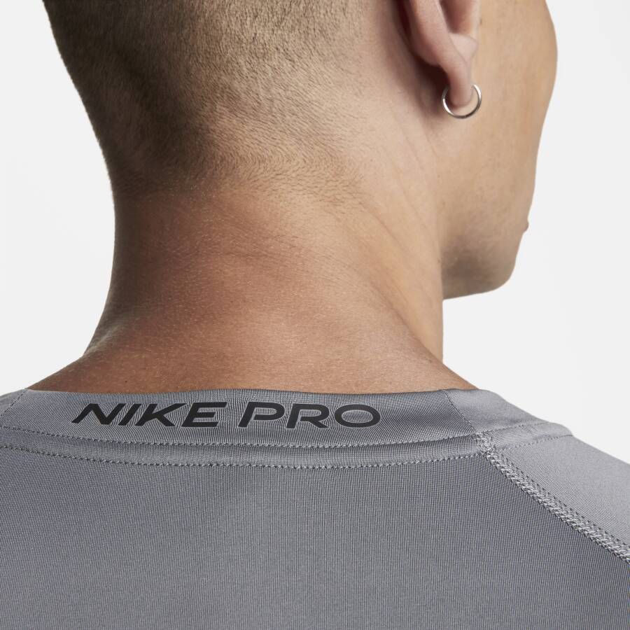 Nike Pro Dri-FIT strakke fitnesstop met korte mouwen voor heren Grijs