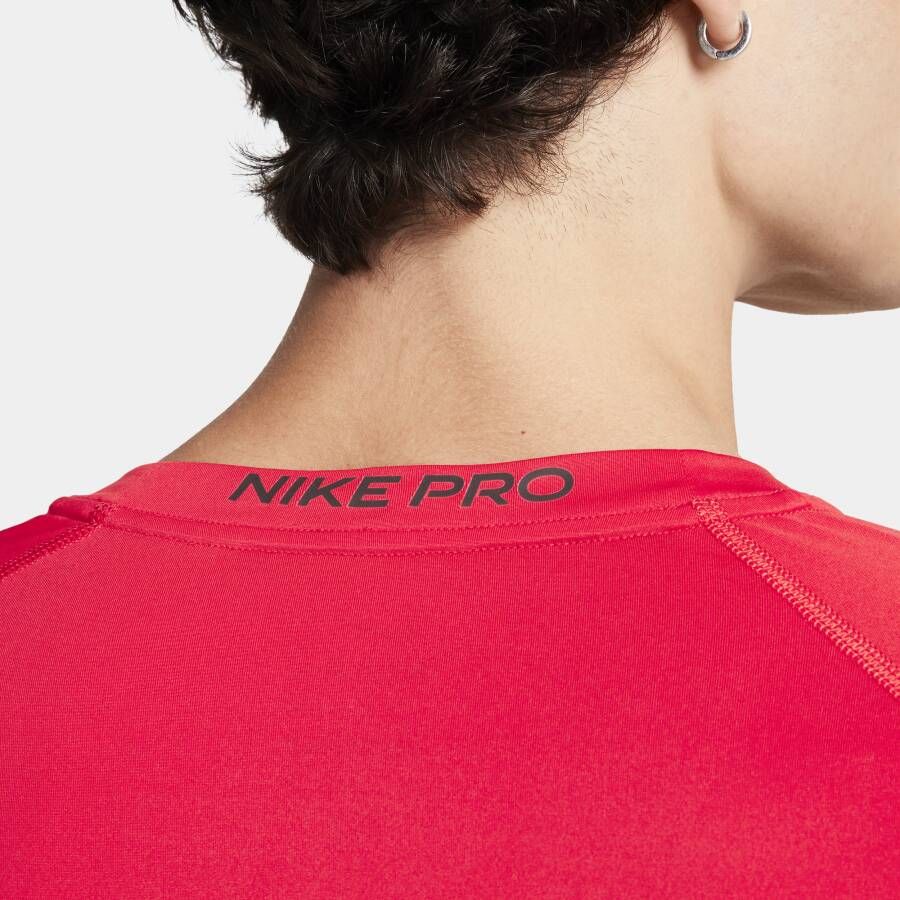 Nike Pro Dri-FIT strakke fitnesstop met lange mouwen voor heren Rood