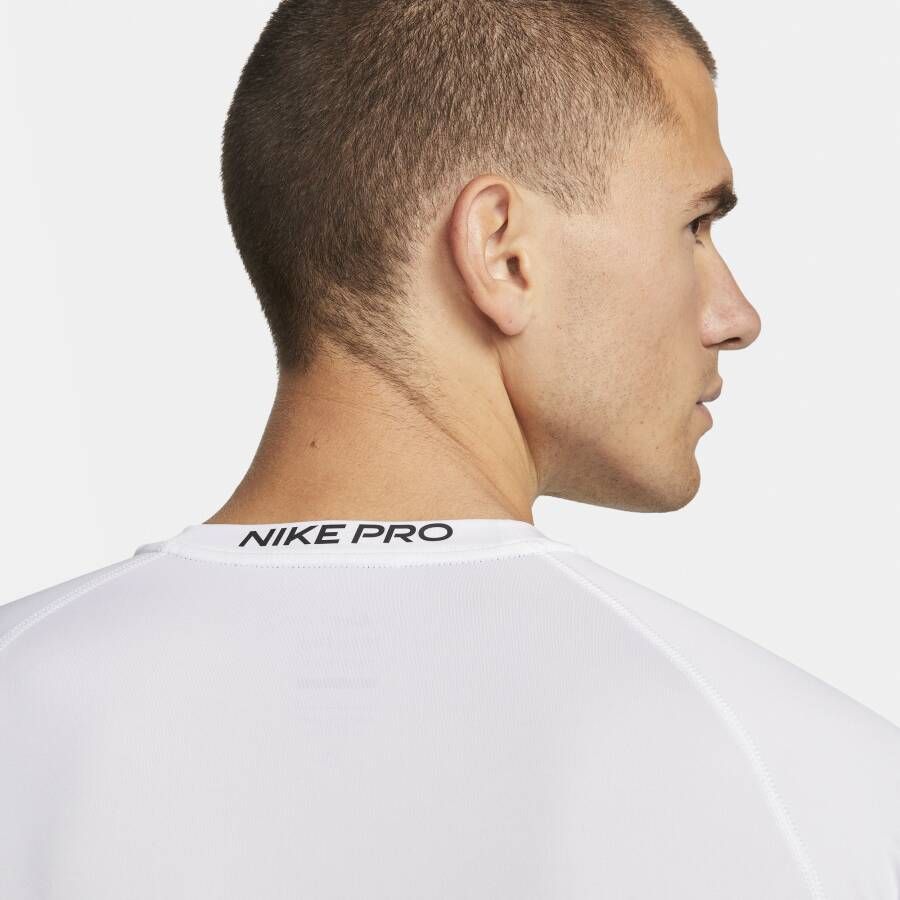Nike Pro Dri-FIT strakke fitnesstop met lange mouwen voor heren Wit