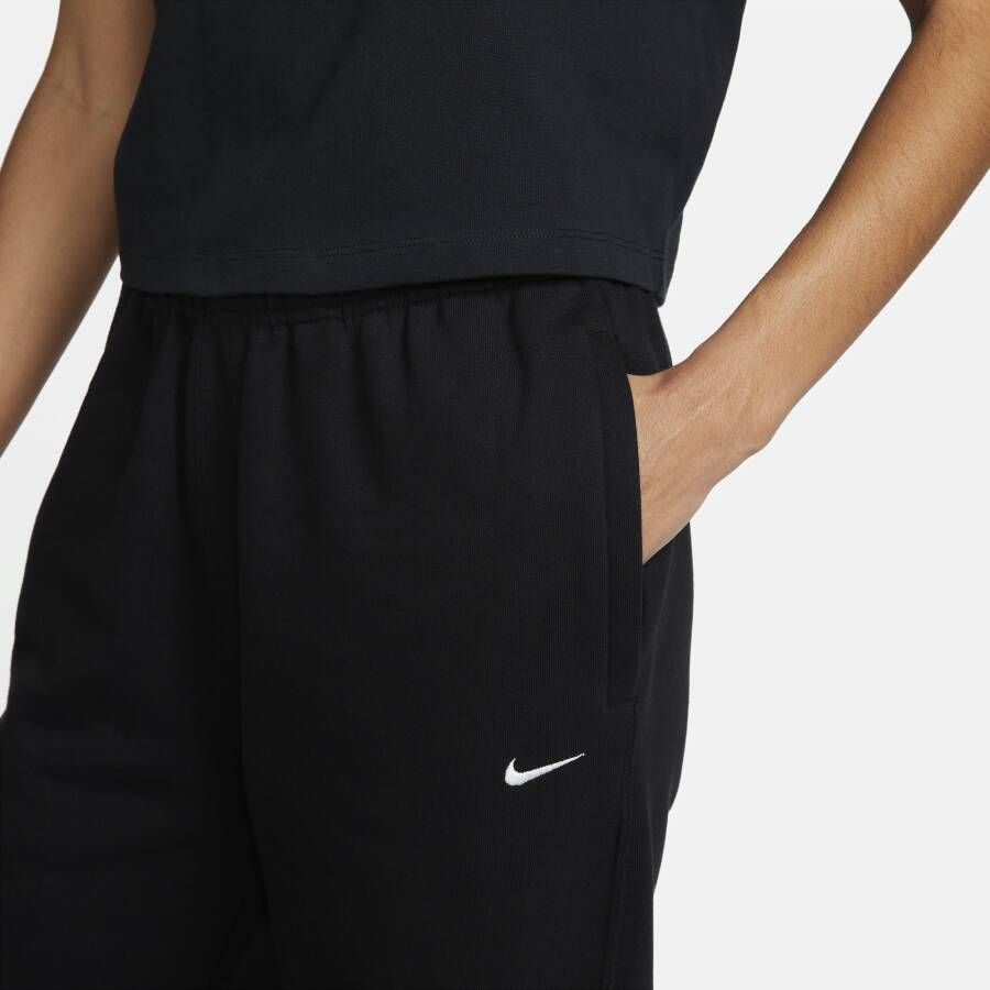 Nike Solo Swoosh Fleecebroek voor dames Zwart