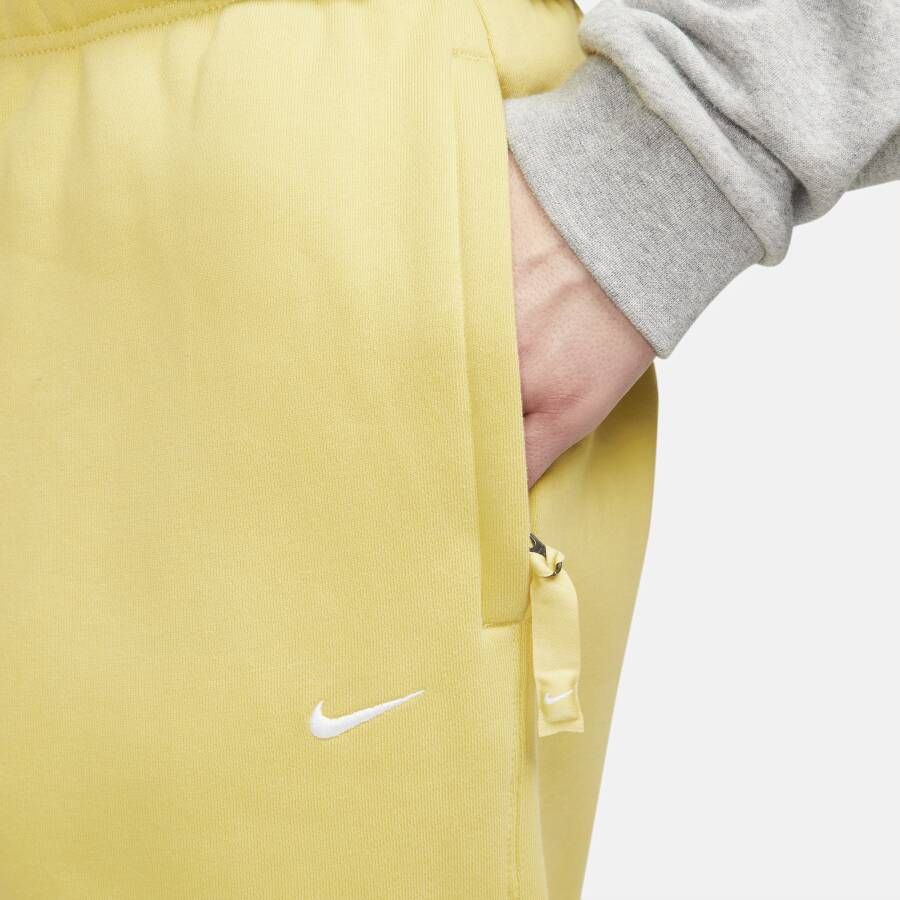 Nike Solo Swoosh Fleecebroek voor heren Geel - Foto 3