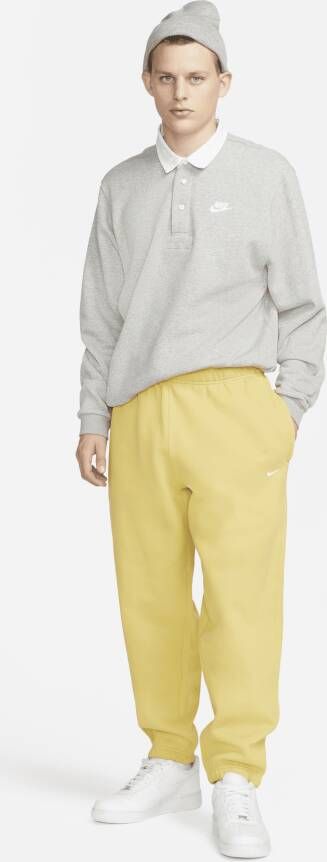 Nike Solo Swoosh Fleecebroek voor heren Geel - Foto 5