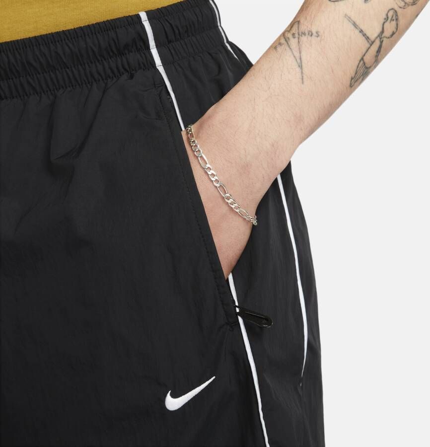 Nike Solo Swoosh trainingsbroek voor heren Zwart - Foto 3