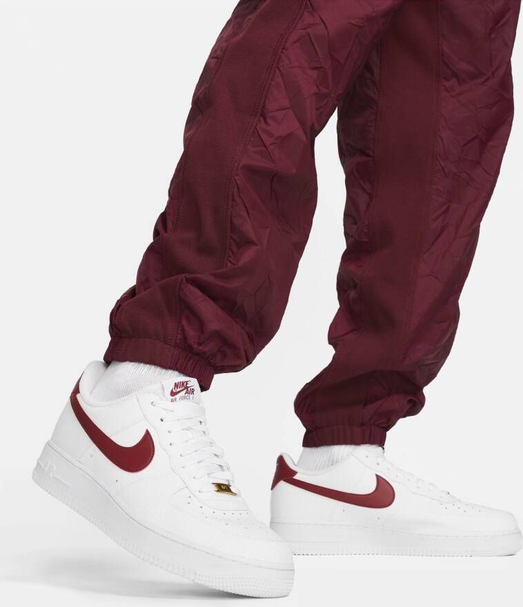 Nike Sportswear Circa Gevoerde trainingsbroek voor de winter voor heren Rood