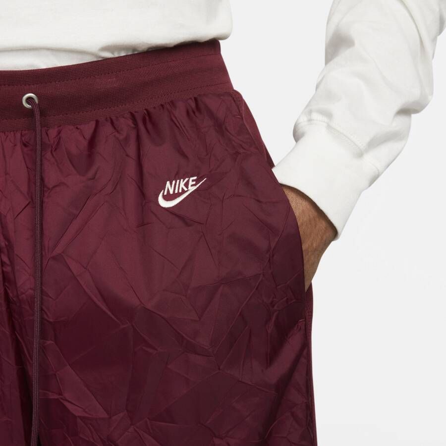 Nike Sportswear Circa Gevoerde trainingsbroek voor de winter voor heren Rood