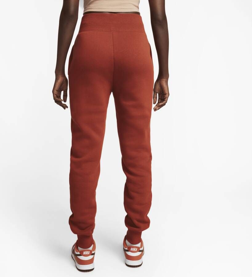 Nike Sportswear Phoenix Fleece Joggingbroek met hoge taille voor dames Oranje