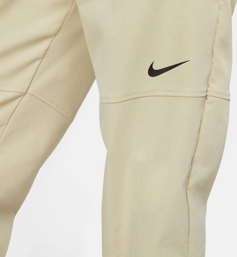Nike Sportswear Swoosh Geweven damesbroek Bruin