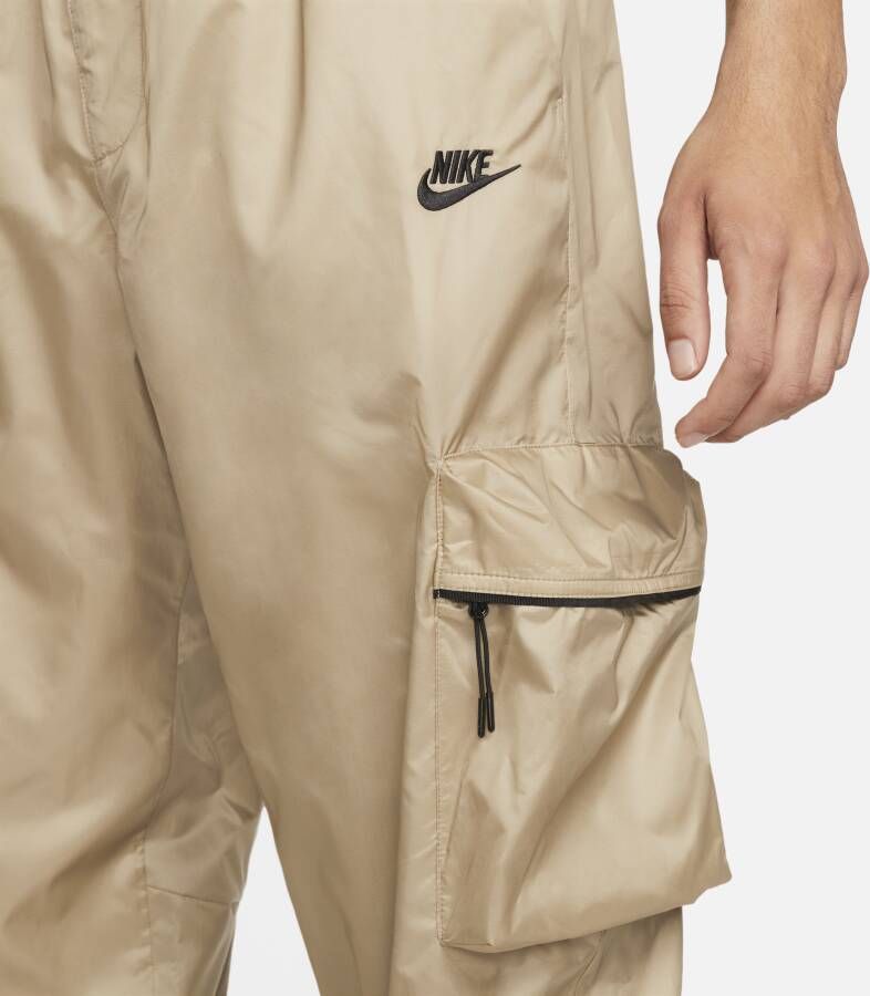 Nike Tech geweven herenbroek met voering Bruin