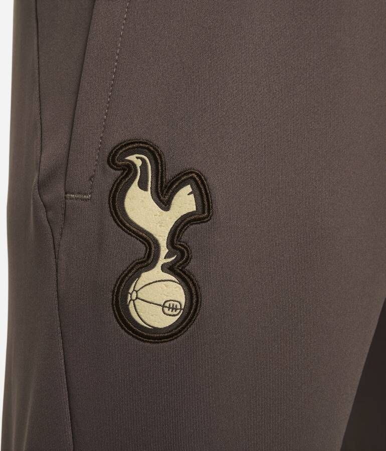 Nike Tottenham Hotspur Strike Derde Dri-FIT knit voetbalbroek voor kids Bruin