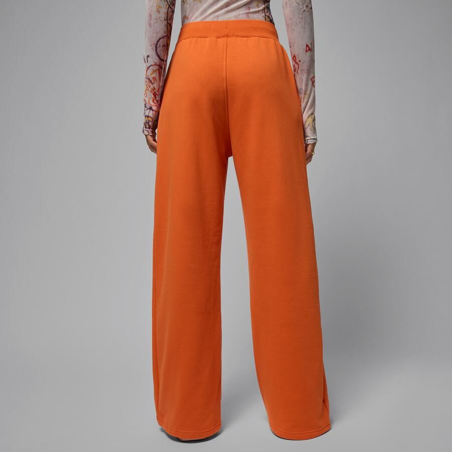 Jordan Flight Fleece damesbroek van sweatstof met open zoom Oranje