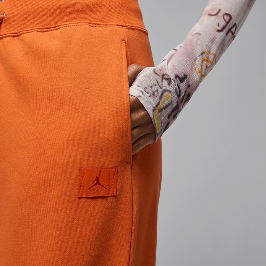 Jordan Flight Fleece damesbroek van sweatstof met open zoom Oranje - Foto 2