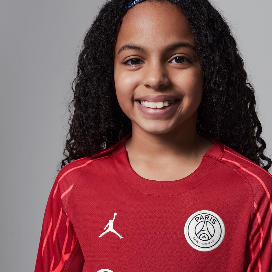 Jordan Paris Saint-Germain 2025 Stadium Goalkeeper Vierde replicavoetbalshirt met lange mouwen en Dri-FIT voor kids Rood