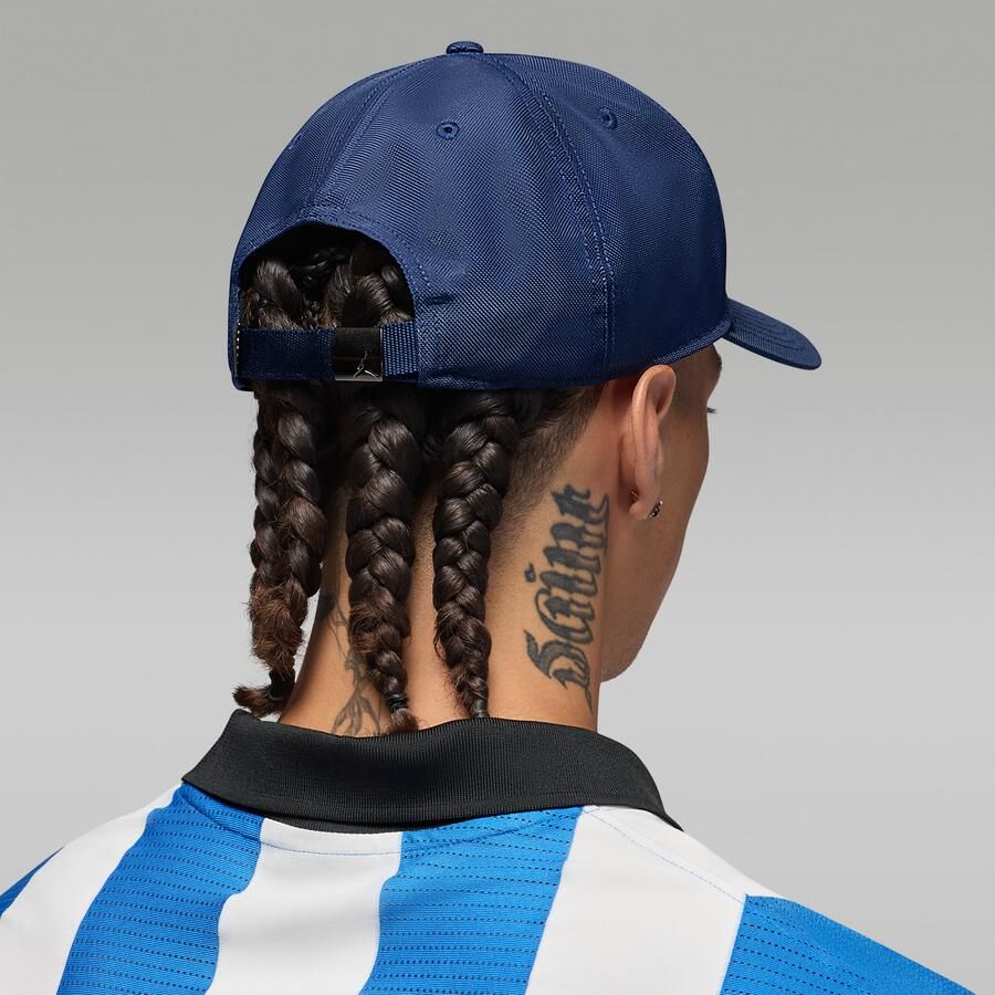 Jordan Rise gestructureerde pet met metalen Jump Blauw