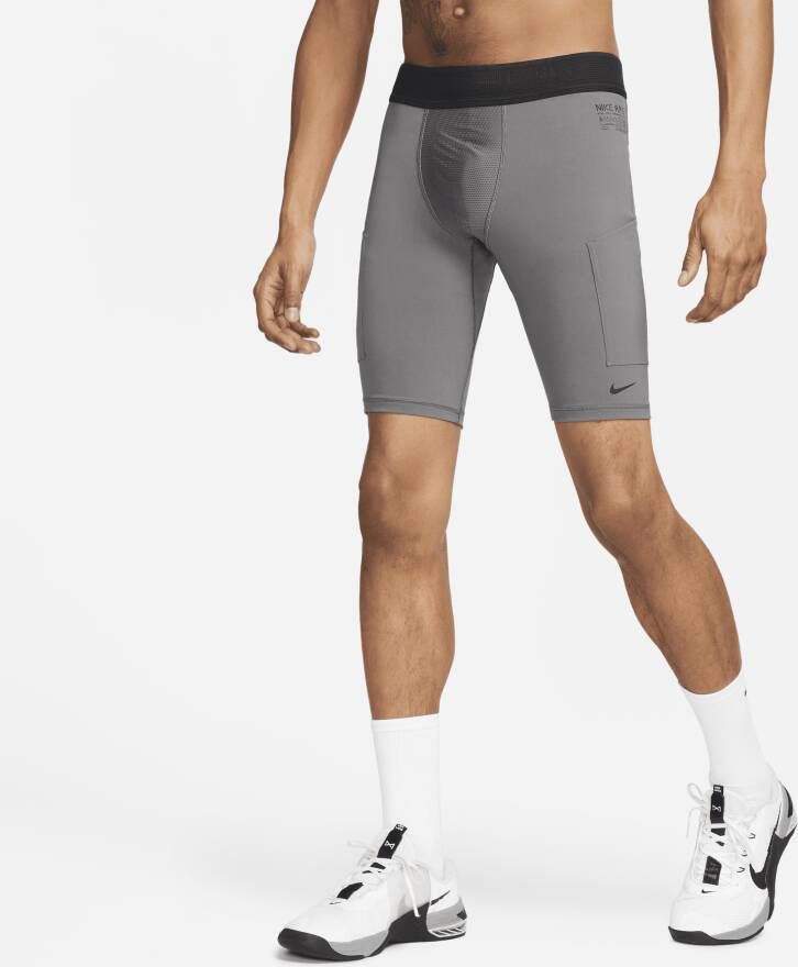 Nike Dri-FIT ADV A.P.S. Fitness shorts als basislaag voor heren Grijs