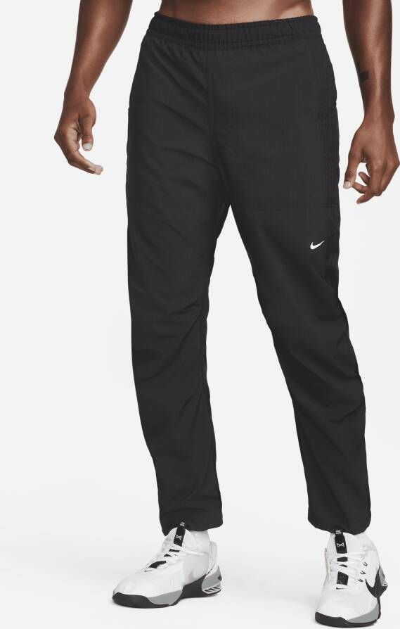 Nike Dri-FIT ADV A.P.S. Geweven fitnessbroek voor heren Zwart