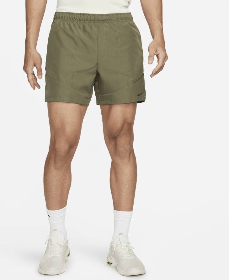 Nike Dri-FIT ADV A.P.S. Niet-gevoerde herenshorts (15 cm) Groen