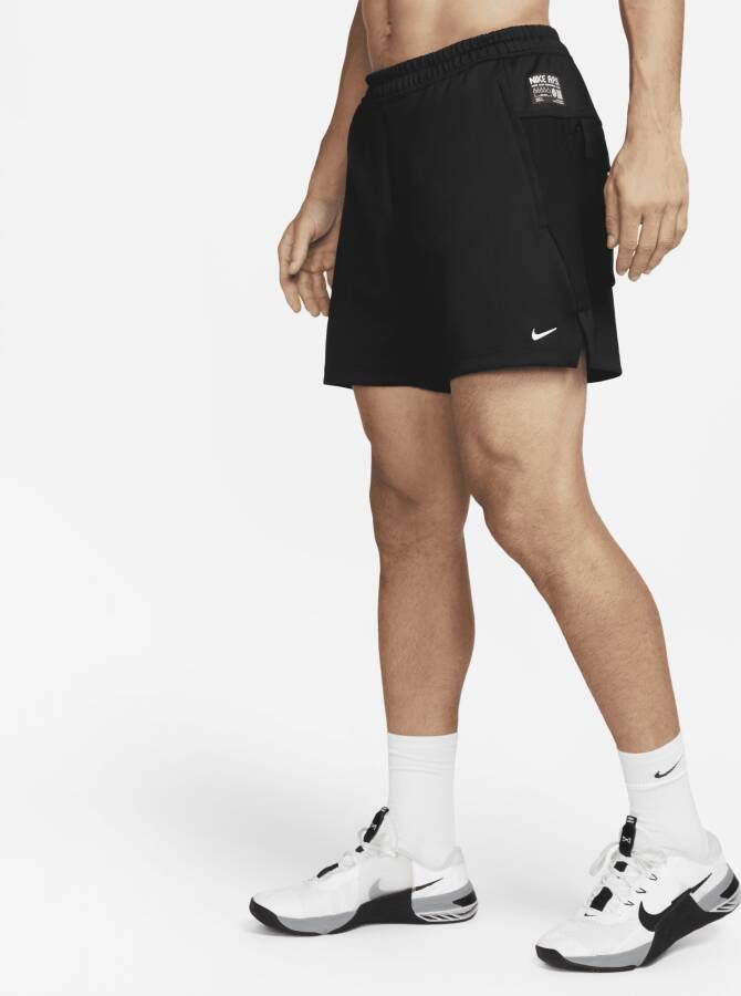Nike Dri-FIT ADV A.P.S. Niet-gevoerde herenshorts (15 cm) Zwart