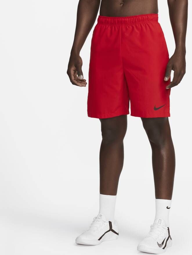 Nike Dri-FIT Geweven trainingsshorts voor heren (23 cm) Rood